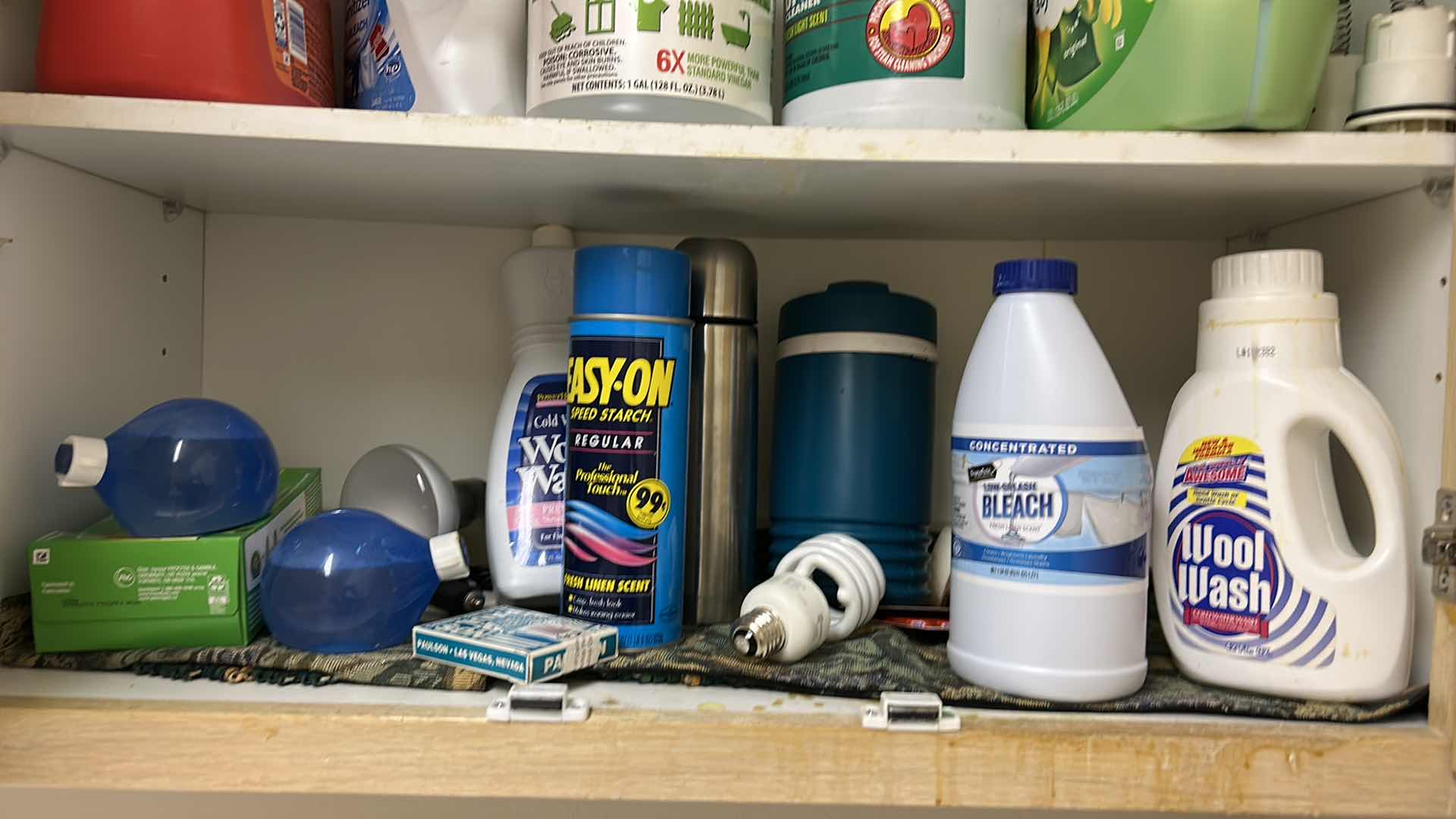 Photo 1 of CONTENTS OF 2 SHELVES IN LAUNDRY ROOM