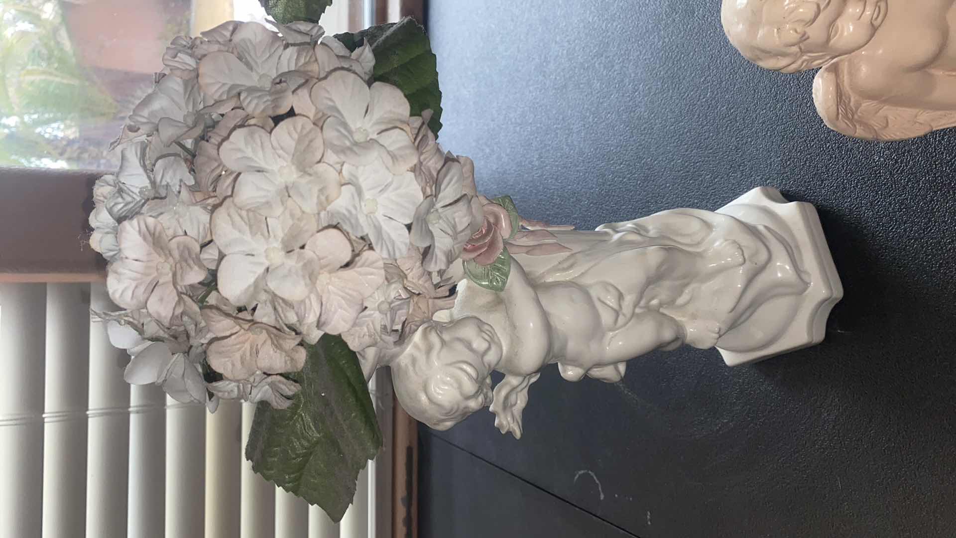 Photo 1 of 3 - CHERUBS TALLEST 11” EXCLUDING FLOWERS
