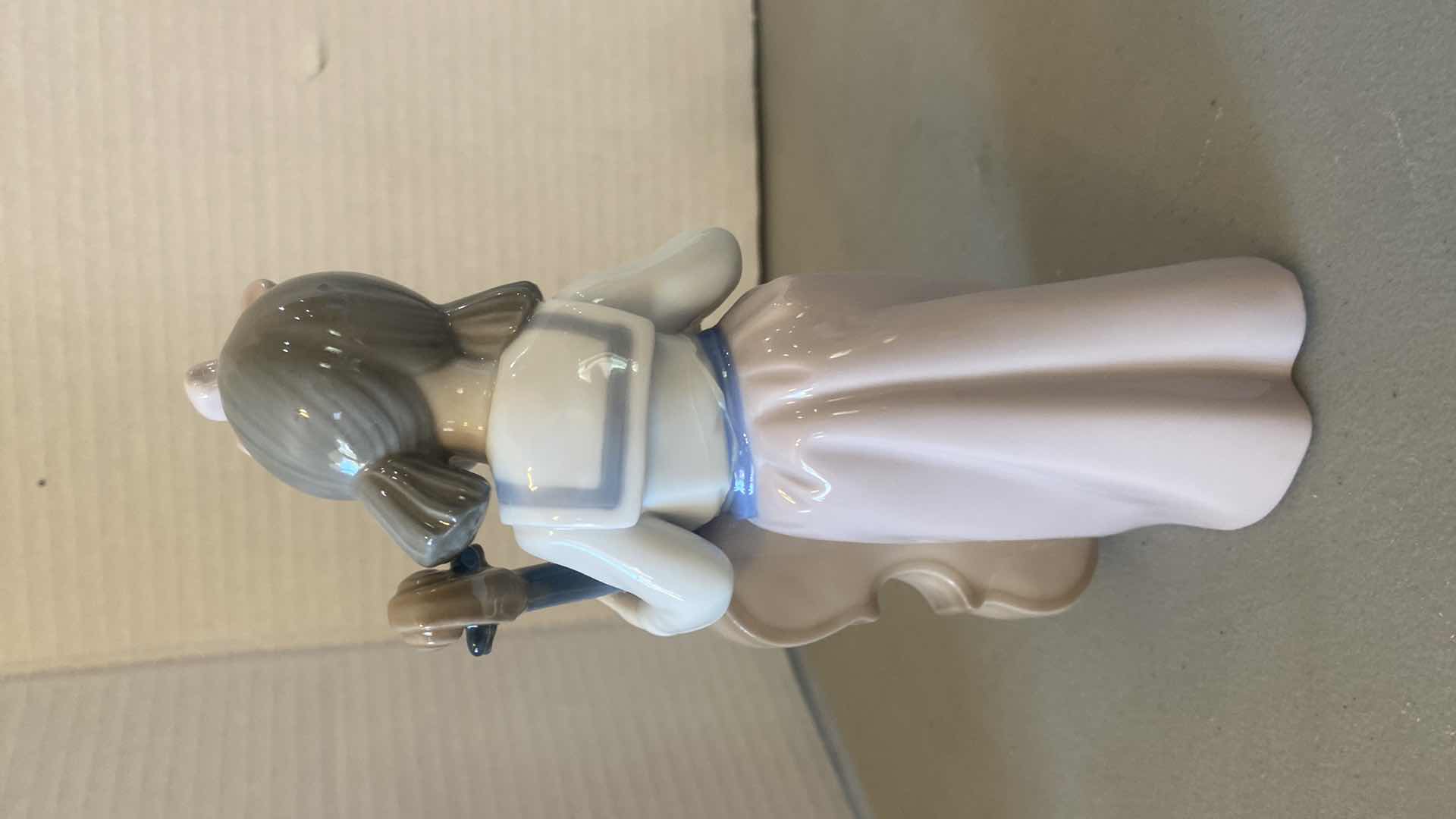 Photo 1 of NAO BY LLADRO PORCELAIN FIGURINE GIRL WITH CELLO H7 1/2”