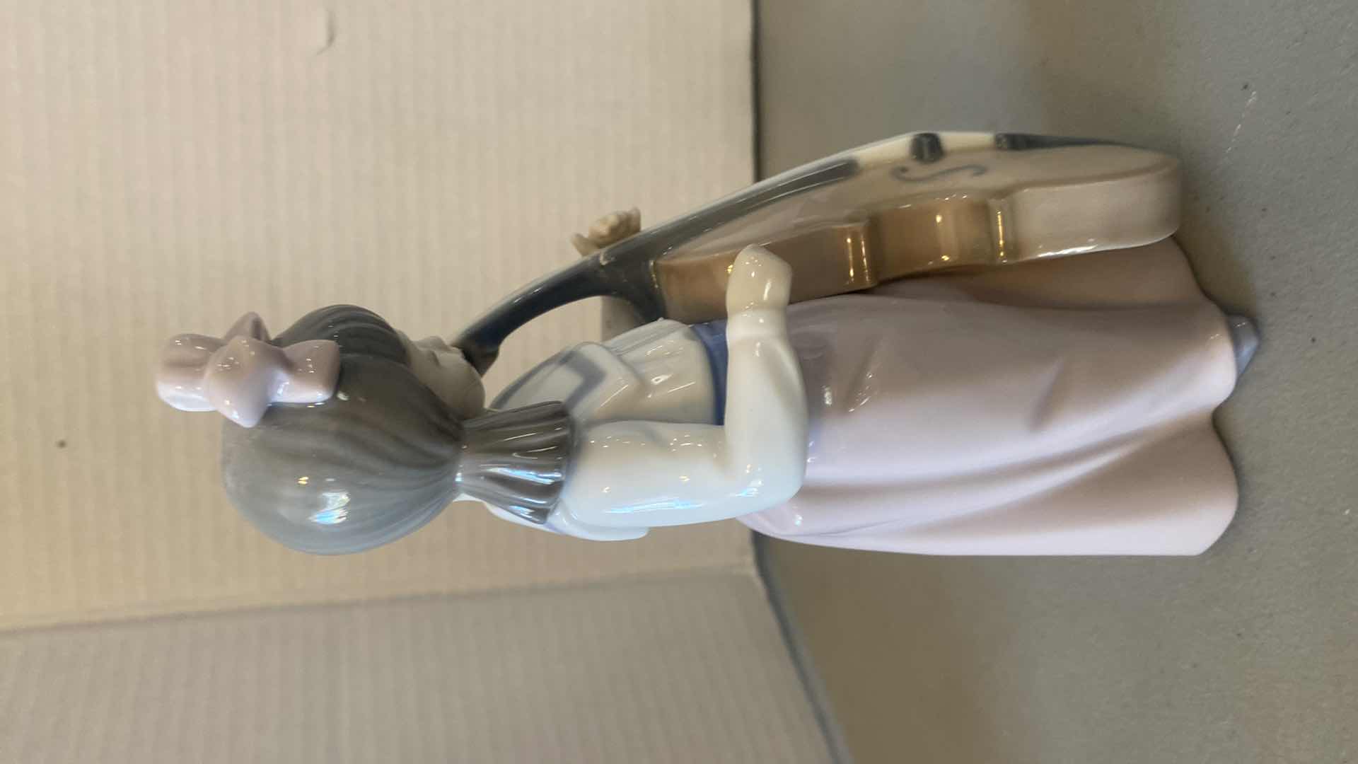 Photo 1 of NAO BY LLADRO PORCELAIN FIGURINE GIRL WITH CELLO H7 1/2”