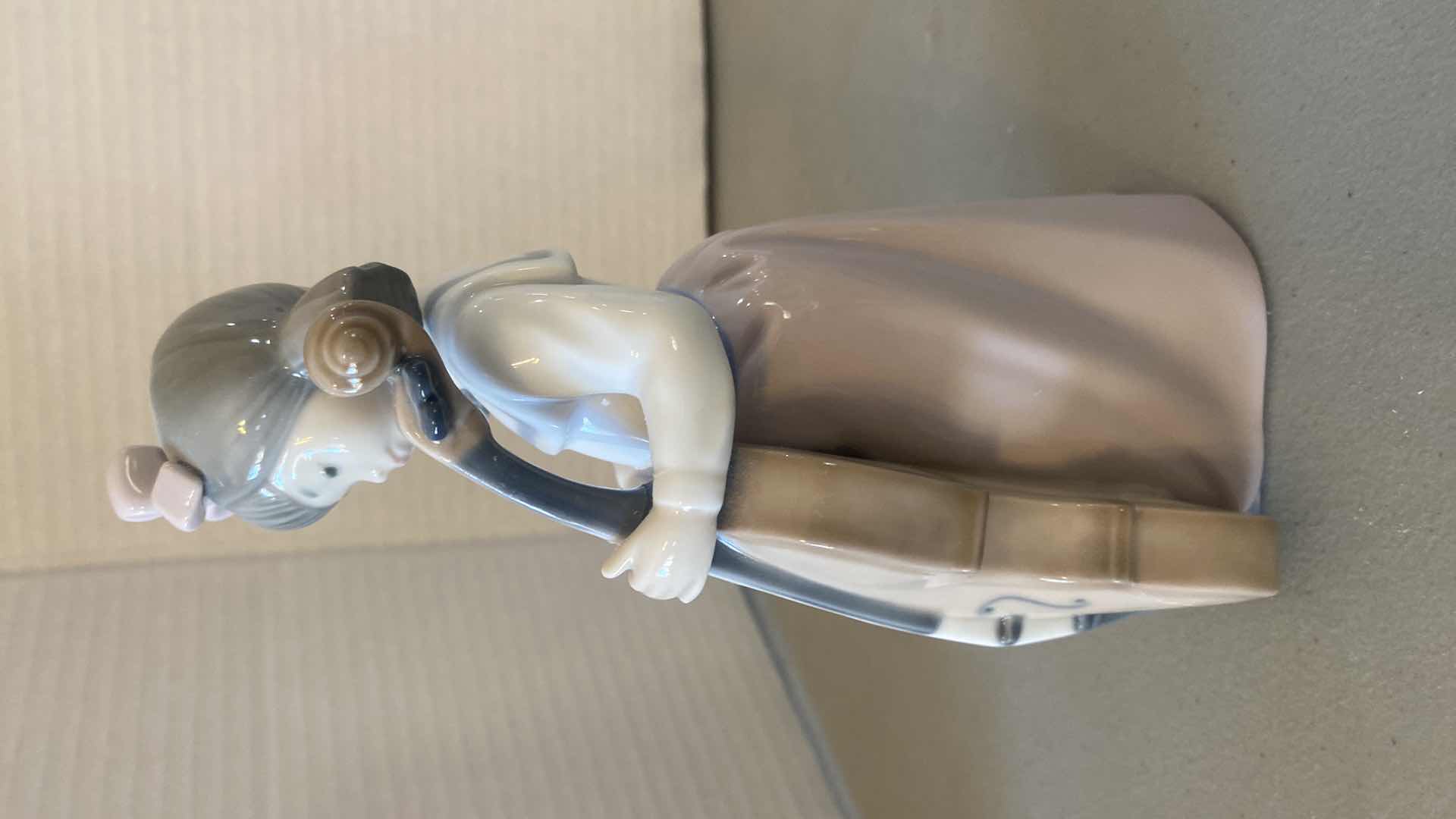 Photo 1 of NAO BY LLADRO PORCELAIN FIGURINE GIRL WITH CELLO H7 1/2”