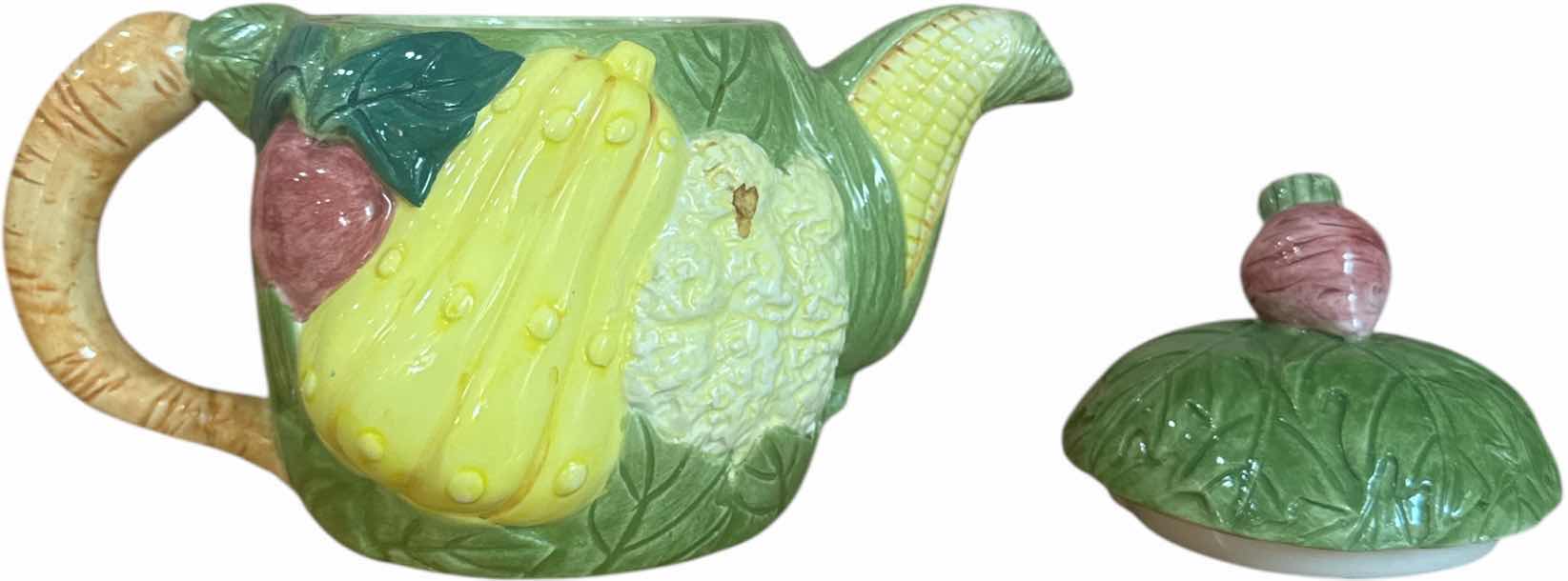 Photo 1 of 2- VINTAGE CERAMIC TEAPOT AND CANISTER VEGETABLE DESIGN 

H10” AND SMALLER