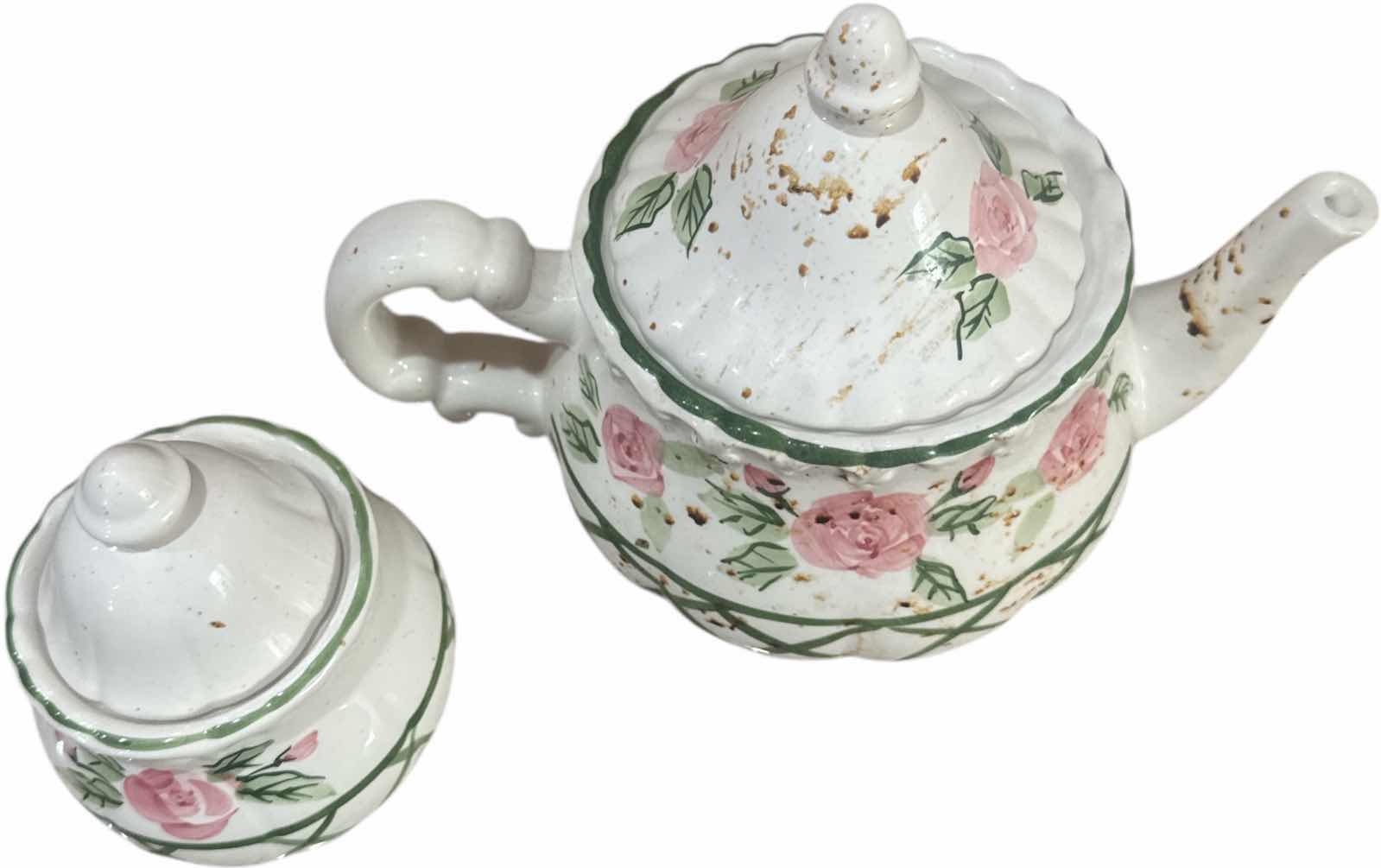 Photo 1 of 2- VINTAGE CERAMIC TEAPOT AND SUGAR BOWL WITH LID PINK ROSES AND LEAVES DESIGN
TEAPOT 
H6.5”