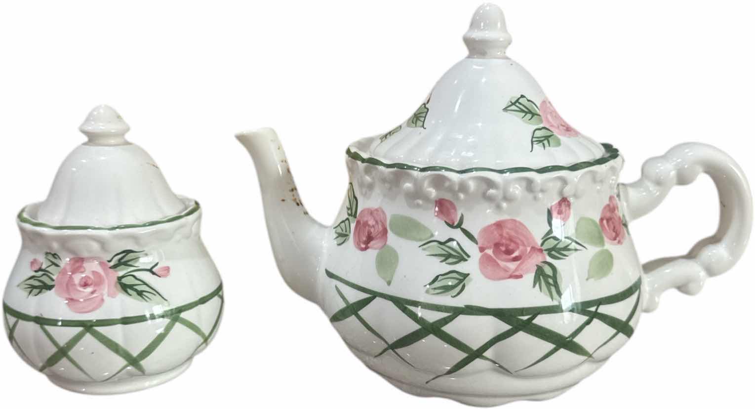 Photo 1 of 2- VINTAGE CERAMIC TEAPOT AND SUGAR BOWL WITH LID PINK ROSES AND LEAVES DESIGN
TEAPOT 
H6.5”