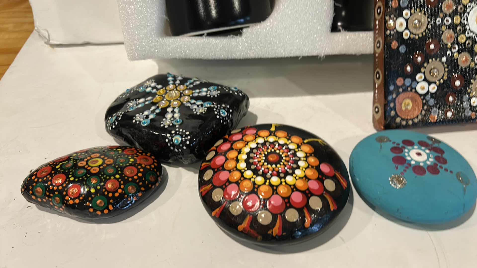 Photo 1 of HALLOWEEN ITEMS AND ROCK PAINTING BOOK AND PAINTED ROCKS