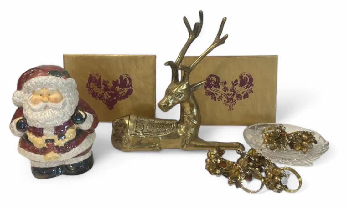 Photo 1 of CHRISTMAS DECOR /  LIDDED SANTA JAR, NAPKIN RINGS, BRASS REINDEER, ARTWORK & GLASS TRINKET DISH