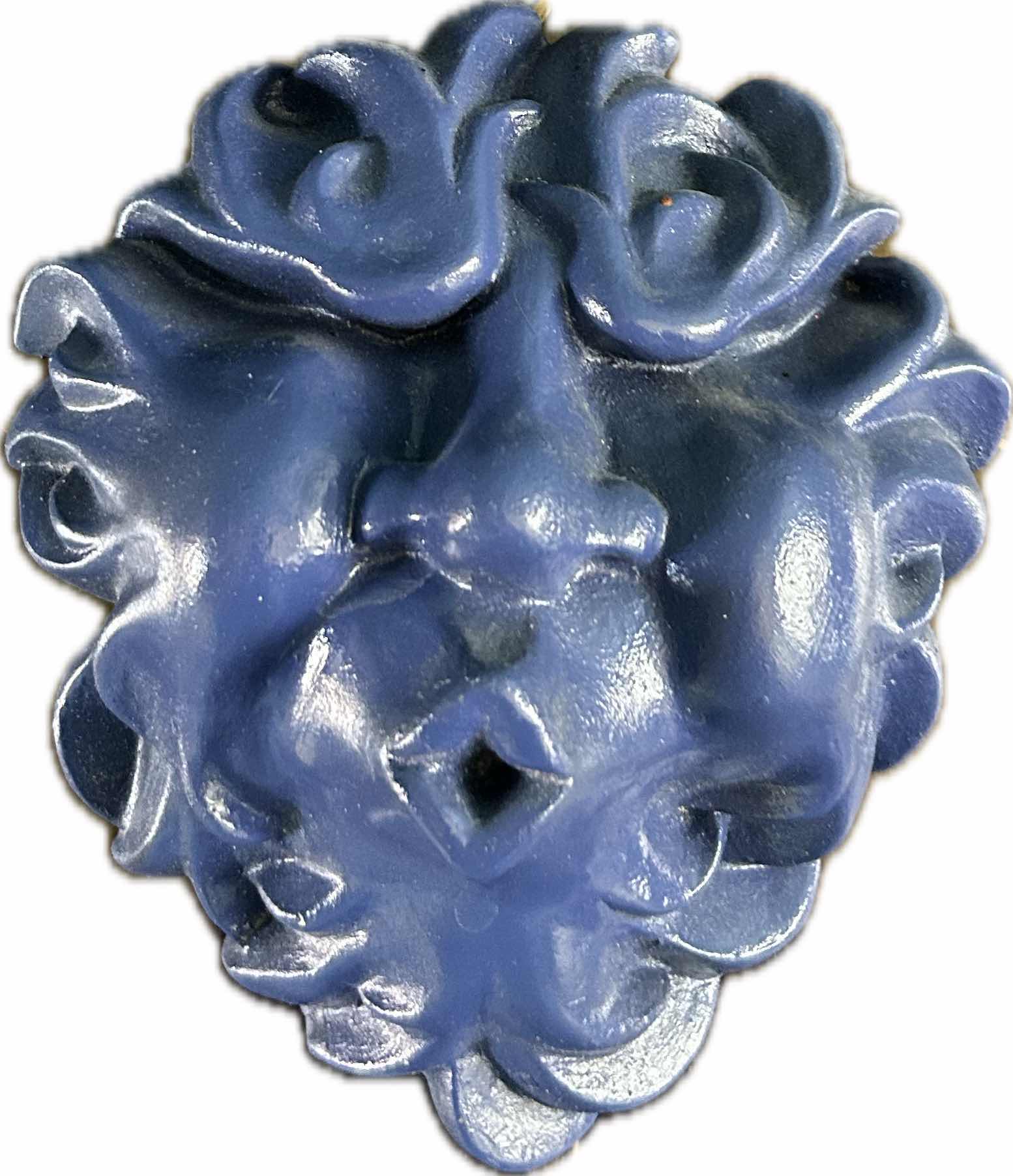 Photo 1 of 2 BLUE PLASTER NORTH WIND WALL DECOR