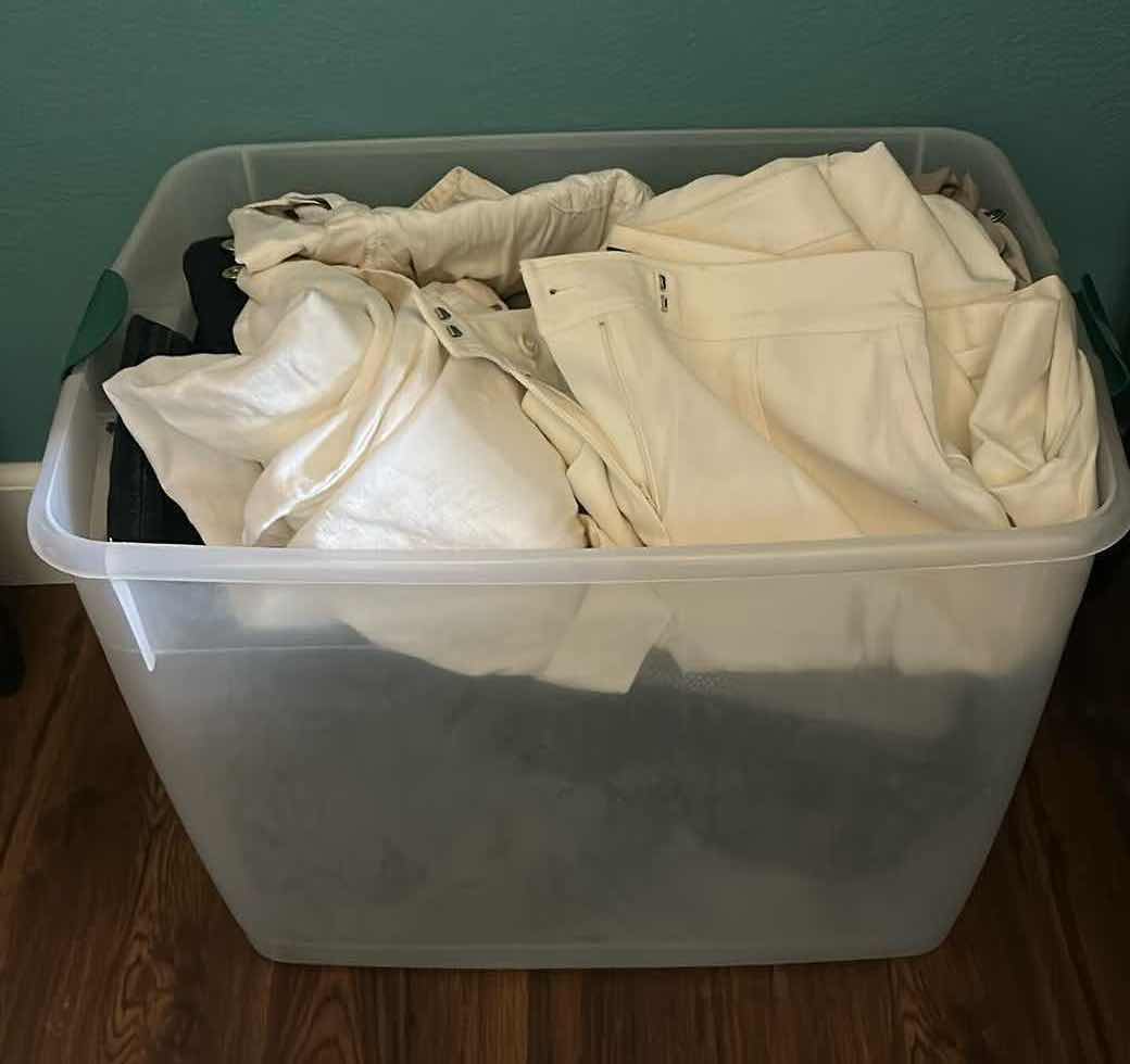 Photo 1 of CONTENTS OF PLASTIC CONTAINER ASSORTED WOMENS PANTS SIZE 6,8,10