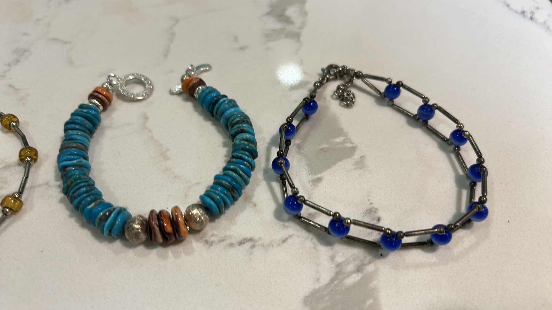 Photo 1 of JEWELRY - 3 BEADED BRACELETS