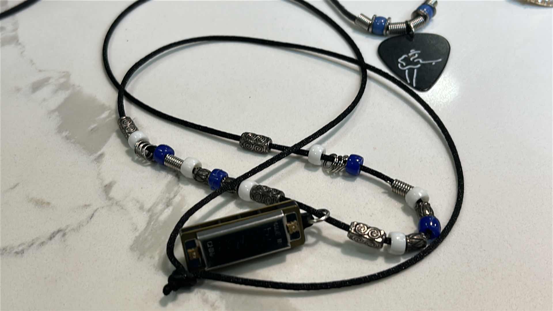Photo 1 of 2 MENS / WOMENS JEWELRY- GUITAR PICK NECKLACE AND HARMONICA NECKLACE