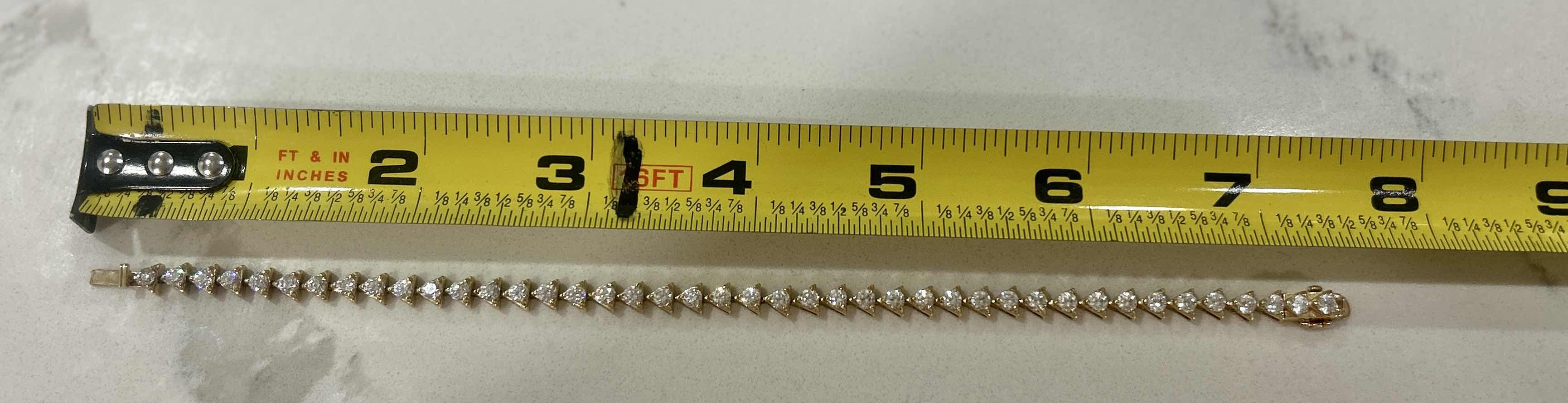 Photo 1 of 7.5” 14K YELLOW GOLD TENNIS BRACELET WITH CZ STONES