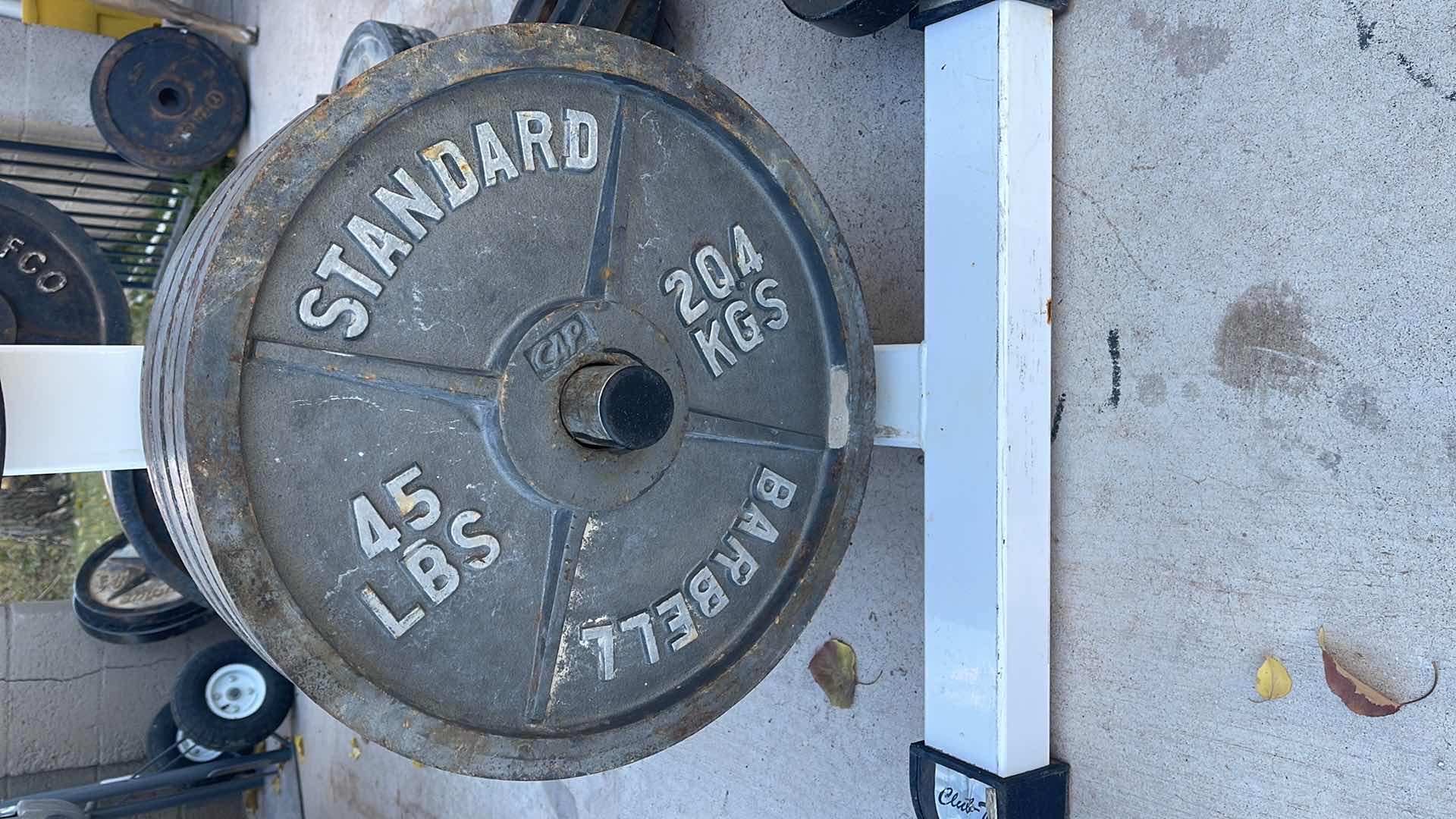 Photo 1 of 1 STANDARD 45LBS BARBELL WEIGHTS