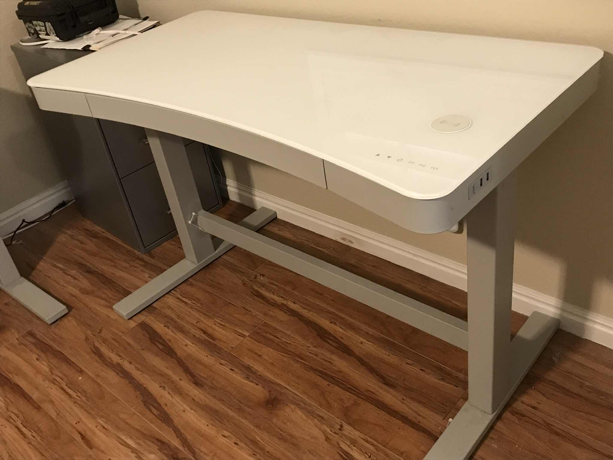 View 2 of TRESANTI POWER ADJUSTABLE CURVED COMPUTER DESK 47x23x29.5 
MORE OF THIS COLLECTION IN AUCTION