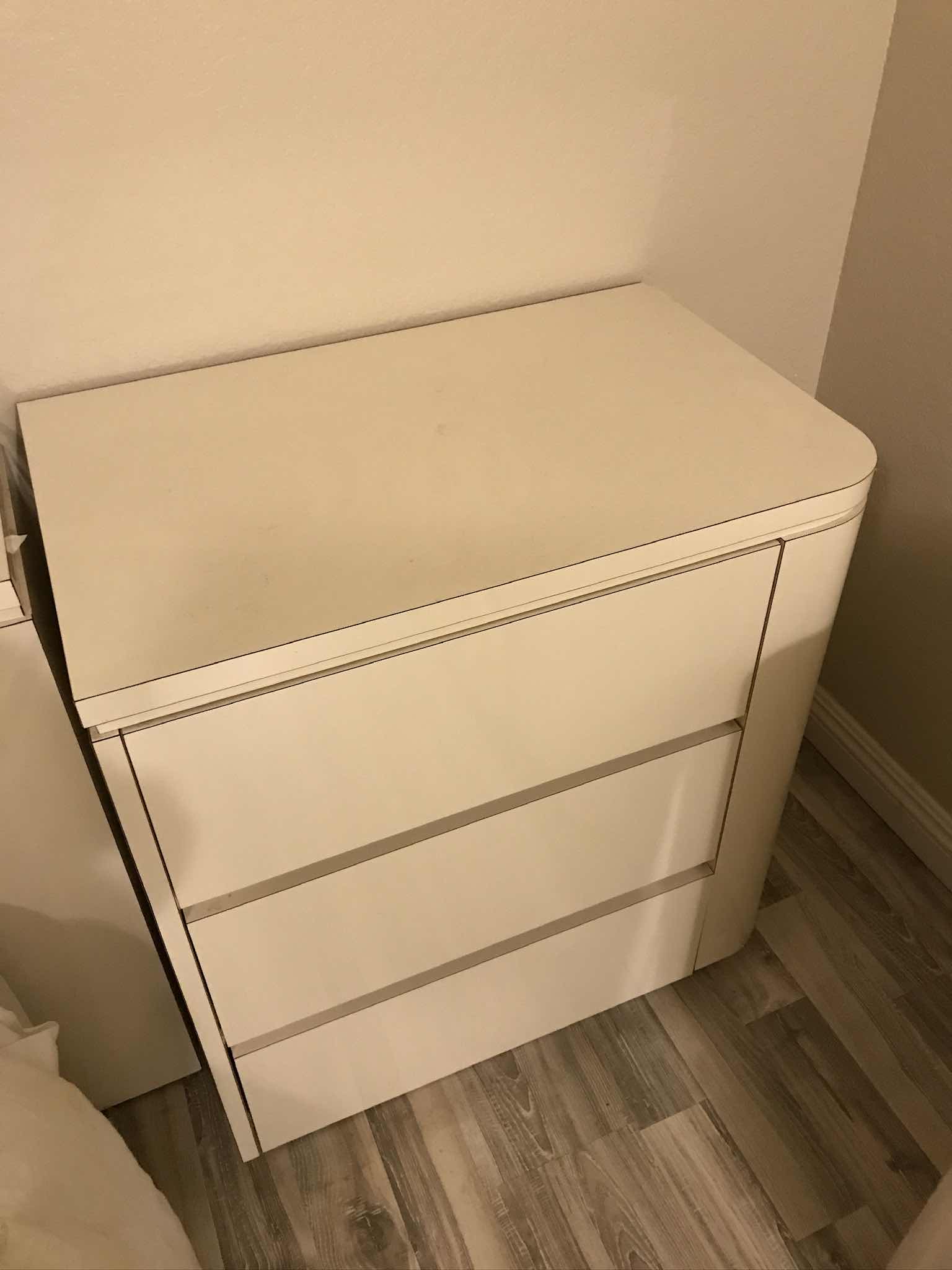 Photo 1 of POSTMODERN WATERFALL LAMINATED LACQUERED NIGHTSTAND 
28 X 18 X 31
MORE OF THIS COLLECTION IN AUCTION