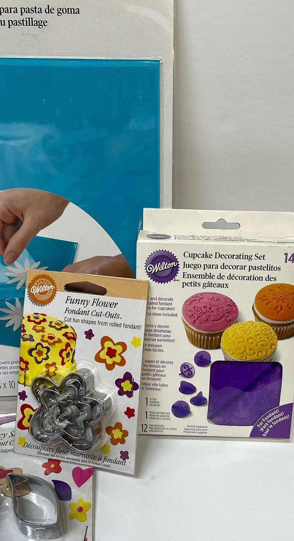 Photo 1 of NIB WILTON FONDANT CUTTERS , GUM PASTE STORAGE BOARD AND MORE