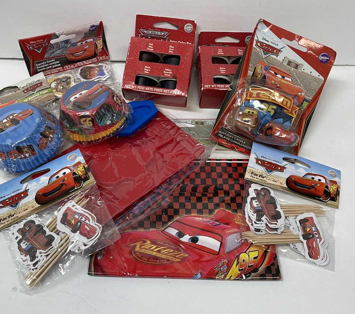 Photo 1 of NEW DISNEY CARS PARTY , LIGHTING MCQUEEN CAKE PAN , CUPCAKE LINERS , GOODIE BAGS , TOPPERS AND MORE - RETAIL PRICE $61.99