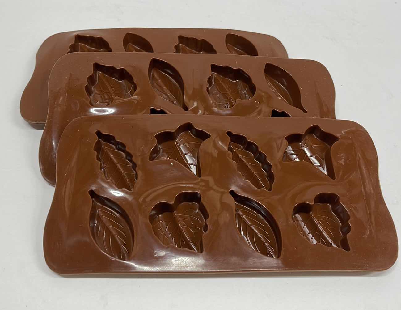 Photo 1 of NEW 3 SILICONE AUTUMN LEAVES CHOCOLATE / CANDY / ICE MOLDS - TOTAL RETAIL PRICE $22.00