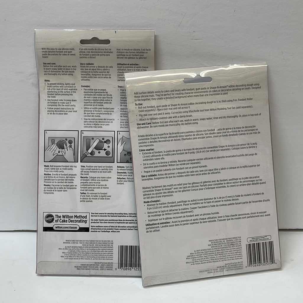 Photo 1 of NEW WILTON FONDANT AND GUM PASTE MOLD “ROBOTS & MONSTERS” & TEXTURE MAT SET - RETAIL PRICE $21.00