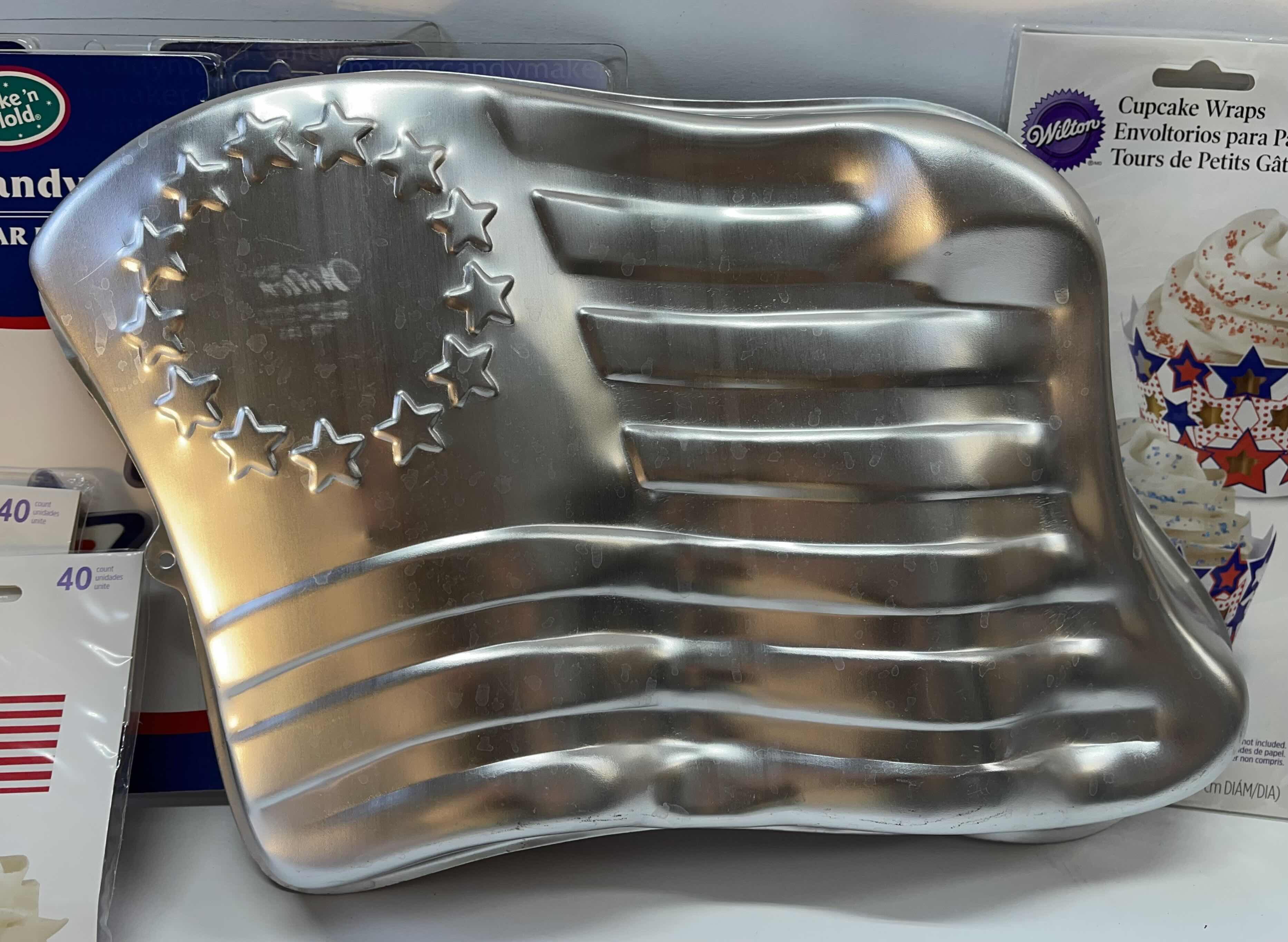 Photo 1 of NEW WILTON AMERICAN FLAG CAKE PAN, CUPCAKE HOLDERS , PICKS, CANDY MOLDS AND MORE- TOTAL RETAIL PRICE $45.00