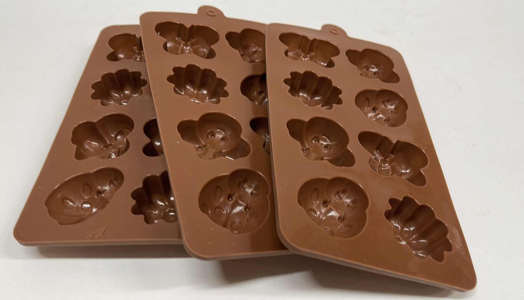 Photo 1 of NEW 3 SILICONE SPRING TIME CHOCOLATE / CANDY / ICE MOLDS - TOTAL RETAIL PRICE $22.00
