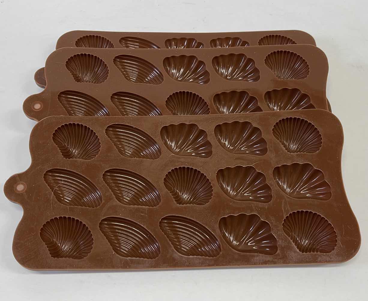Photo 1 of NEW SILICONE SHELL CHOCOLATE / CANDY / ICE MOLDS - TOTAL RETAIL PRICE $22.00