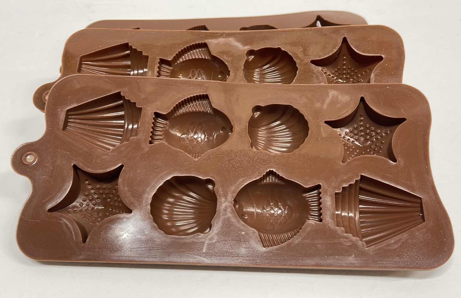 View 2 of NEW 3 SILICONE TEA OCEAN CHOCOLATE / CANDY / ICE MOLDS - TOTAL RETAIL PRICE $22.00
