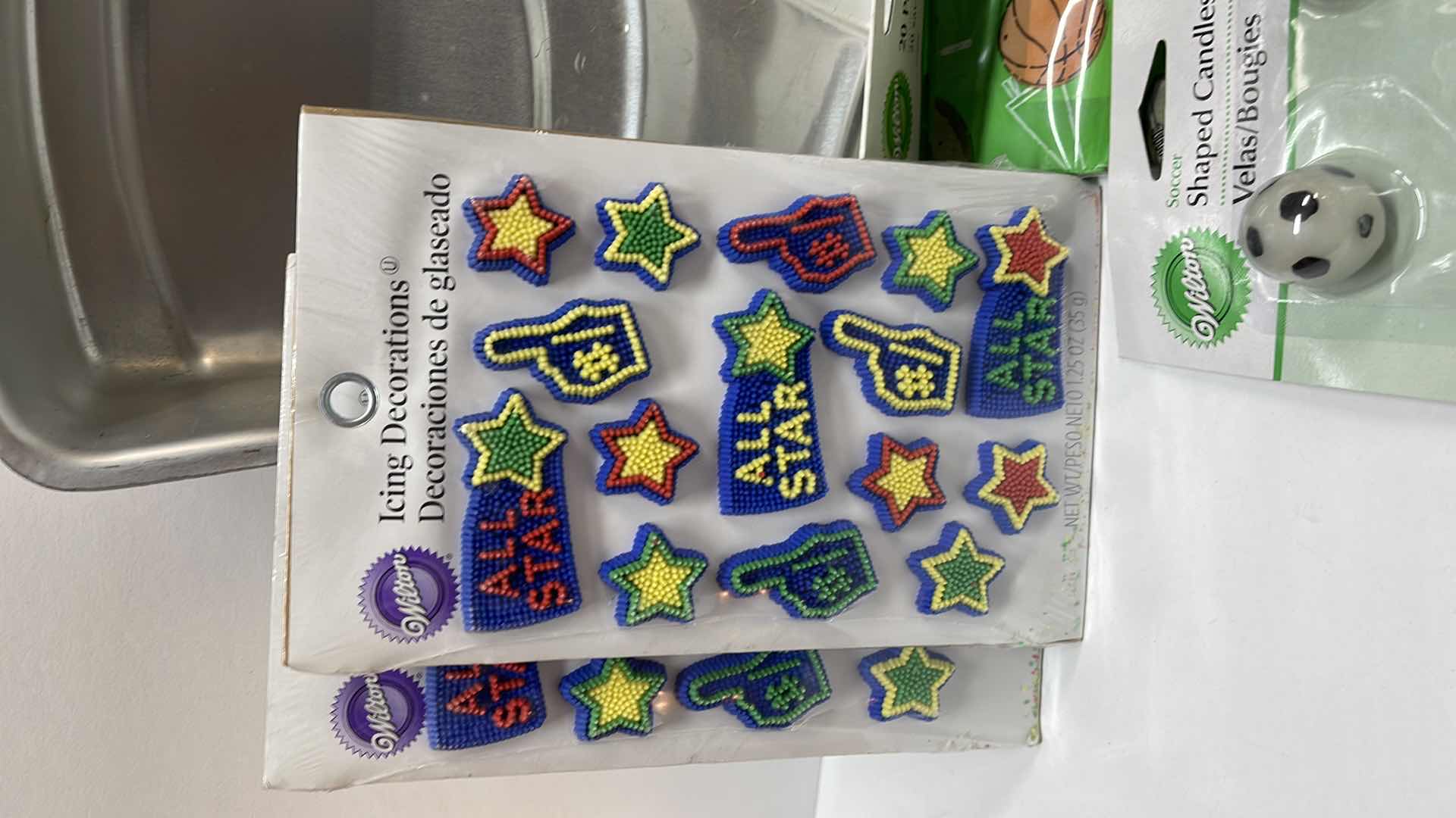 Photo 1 of NOS WILTON SPORTS CAKE PAN , SOCCER CUPCAKE LINERS , CANDLES & MORE - TOTAL RETAIL PRICE $34.00