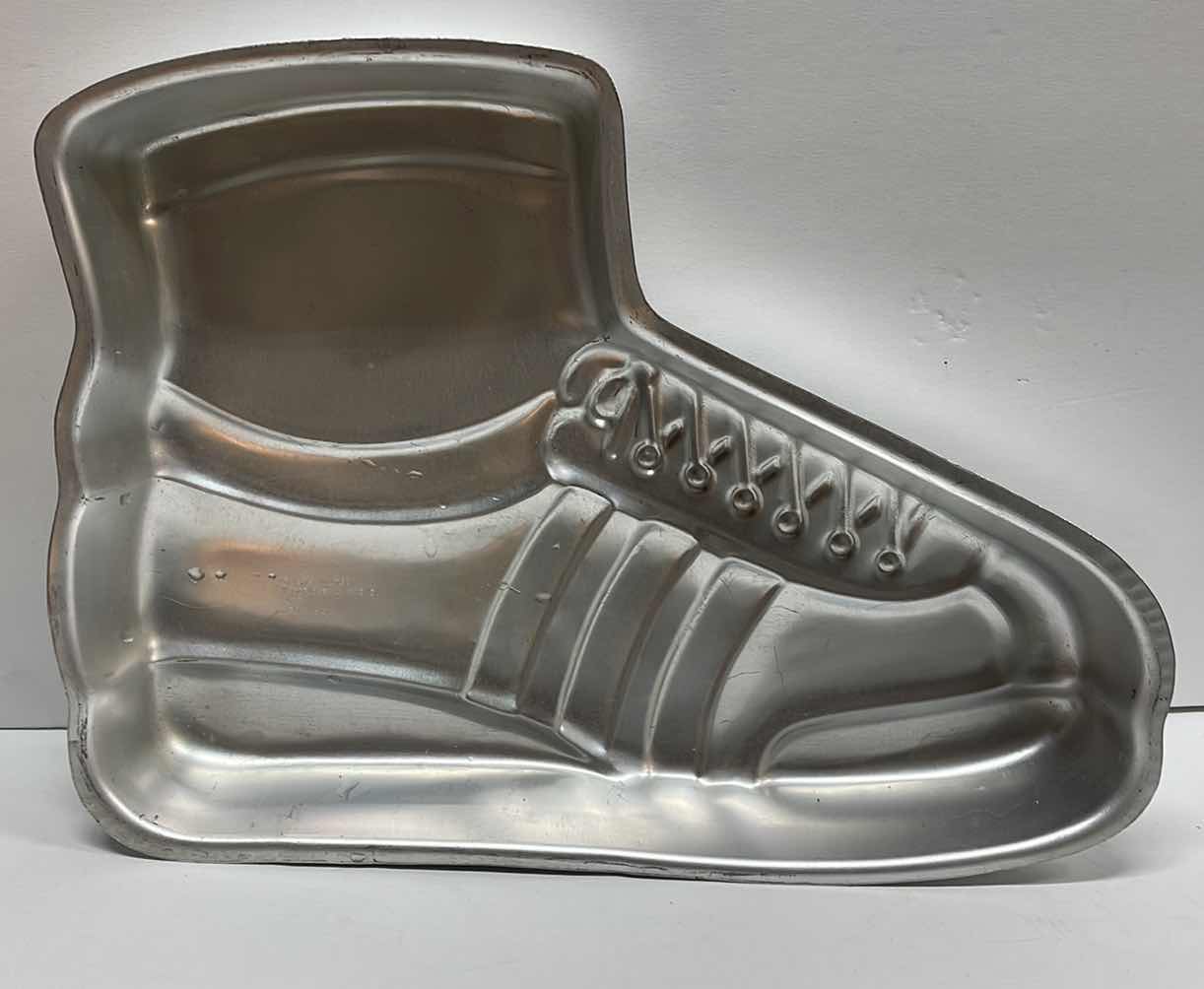 Photo 1 of NOS WILTON SPORTS CAKE PAN , SOCCER CUPCAKE LINERS , CANDLES & MORE - TOTAL RETAIL PRICE $34.00