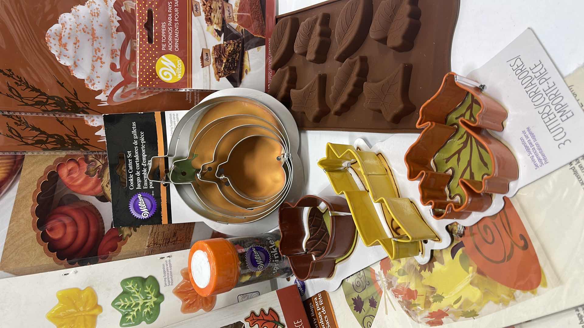 Photo 1 of NEW FALL BAKING COLLECTION, MOLDS, COOKIE CUTTERS, TREAT BAGS AND MUCH MORE- TOTAL RETAIL PRICE $50.99