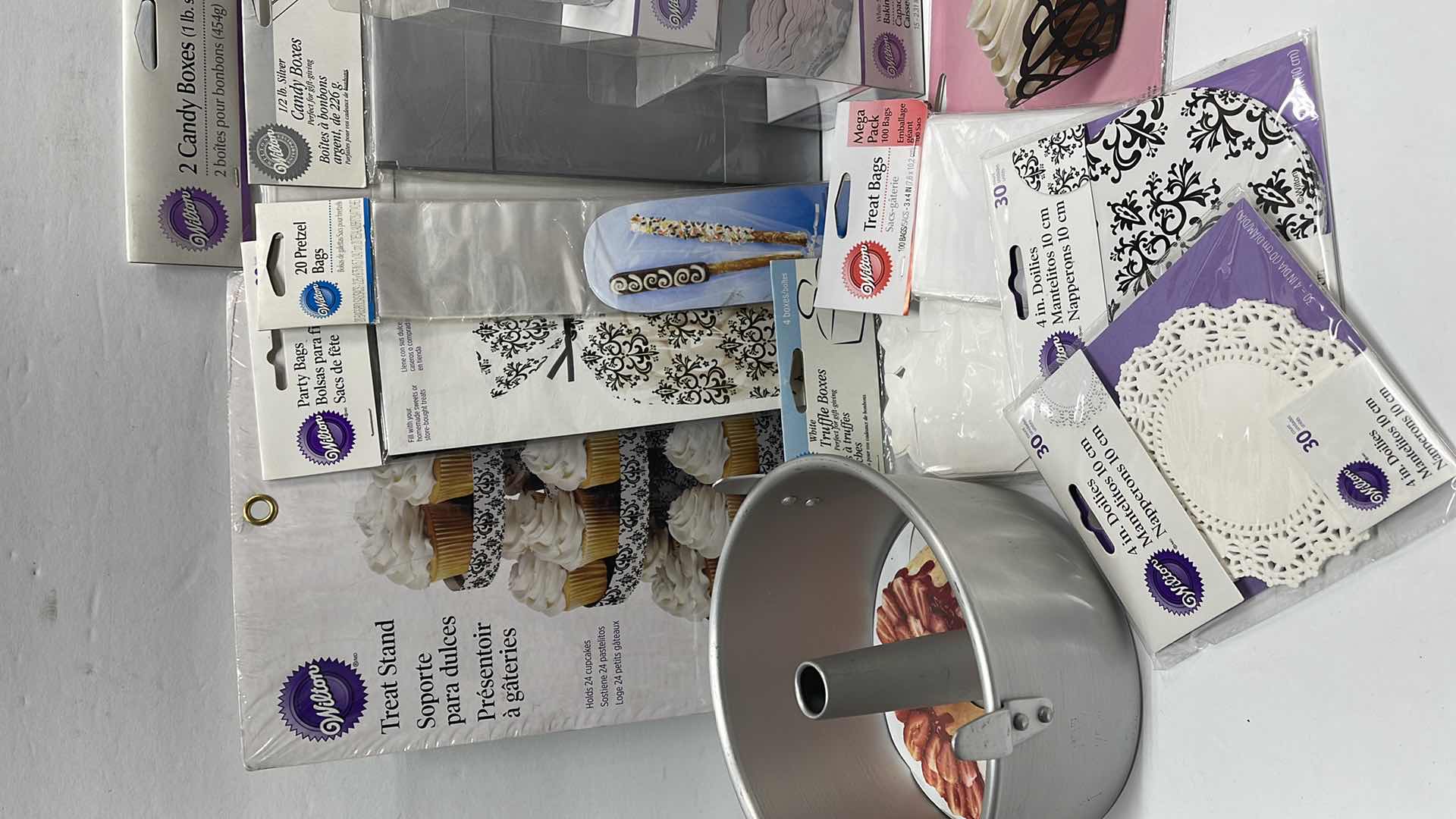 Photo 1 of NEW BAKING AND PARTY SUPPLIES, ANGEL FOOD CAKE PAN AND MORE - TOTAL RETAIL PRICE $ 52.00