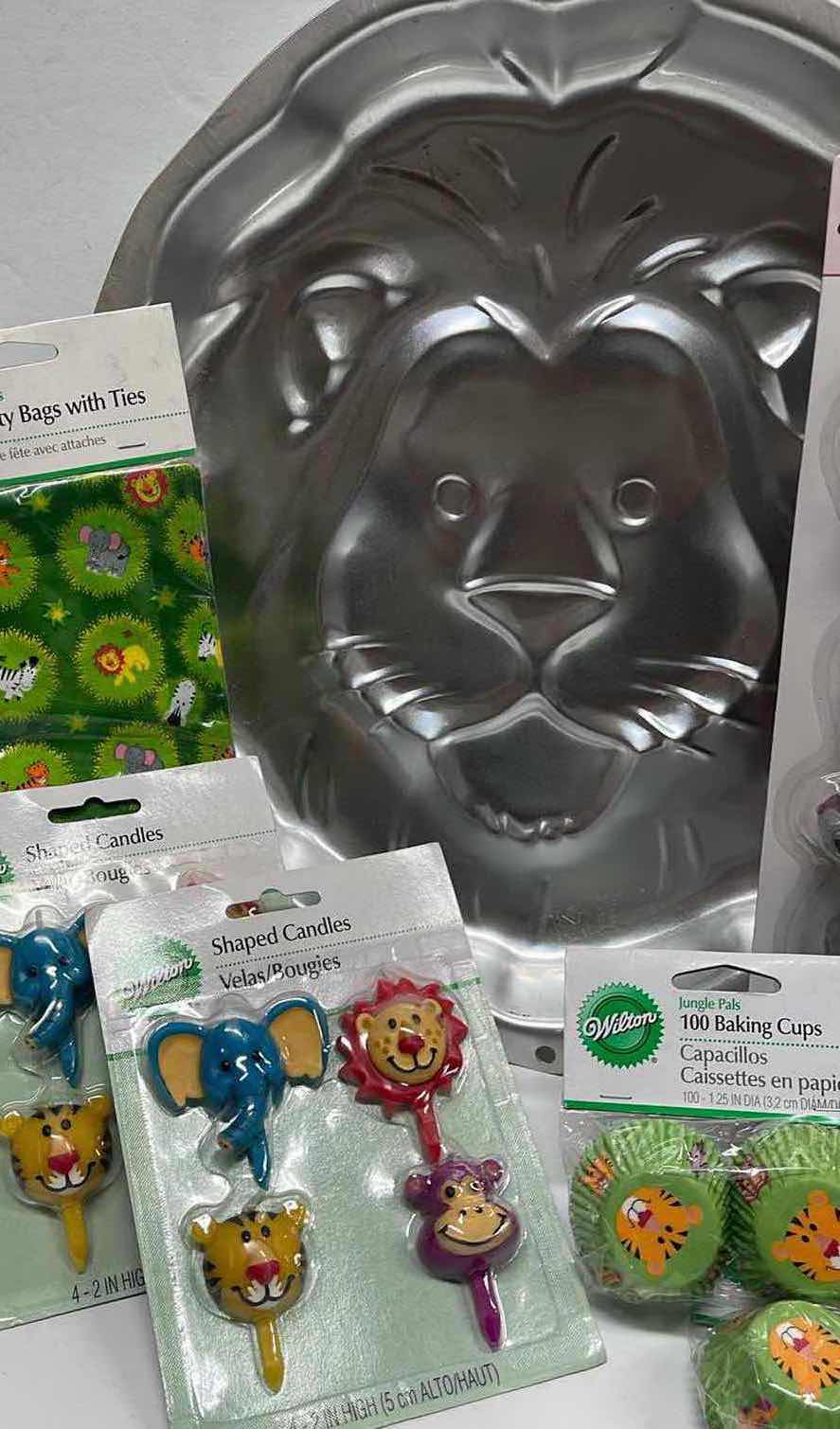 Photo 1 of NEW WILTON JUNGLE ANIMAL PARTY SUPPLIES W/ NOS VINTAGE LION CAKE PAN - TOTAL RETAIL PRICE $48.99