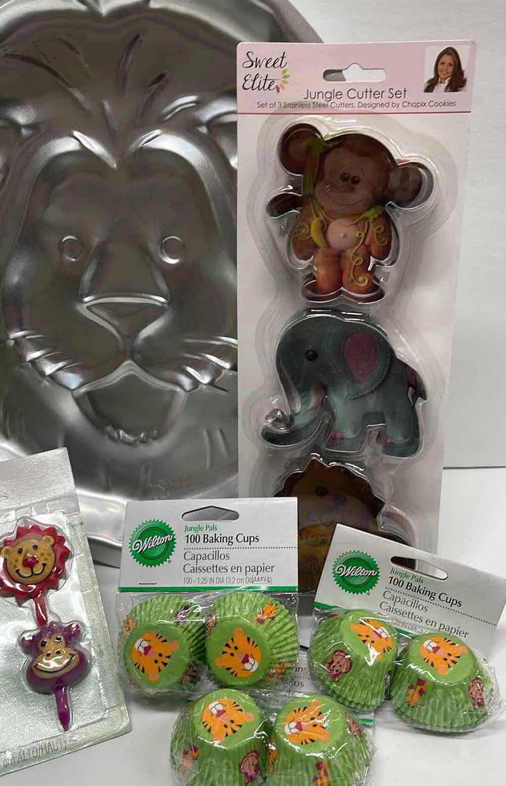 Photo 1 of NEW WILTON JUNGLE ANIMAL PARTY SUPPLIES W/ NOS VINTAGE LION CAKE PAN - TOTAL RETAIL PRICE $48.99