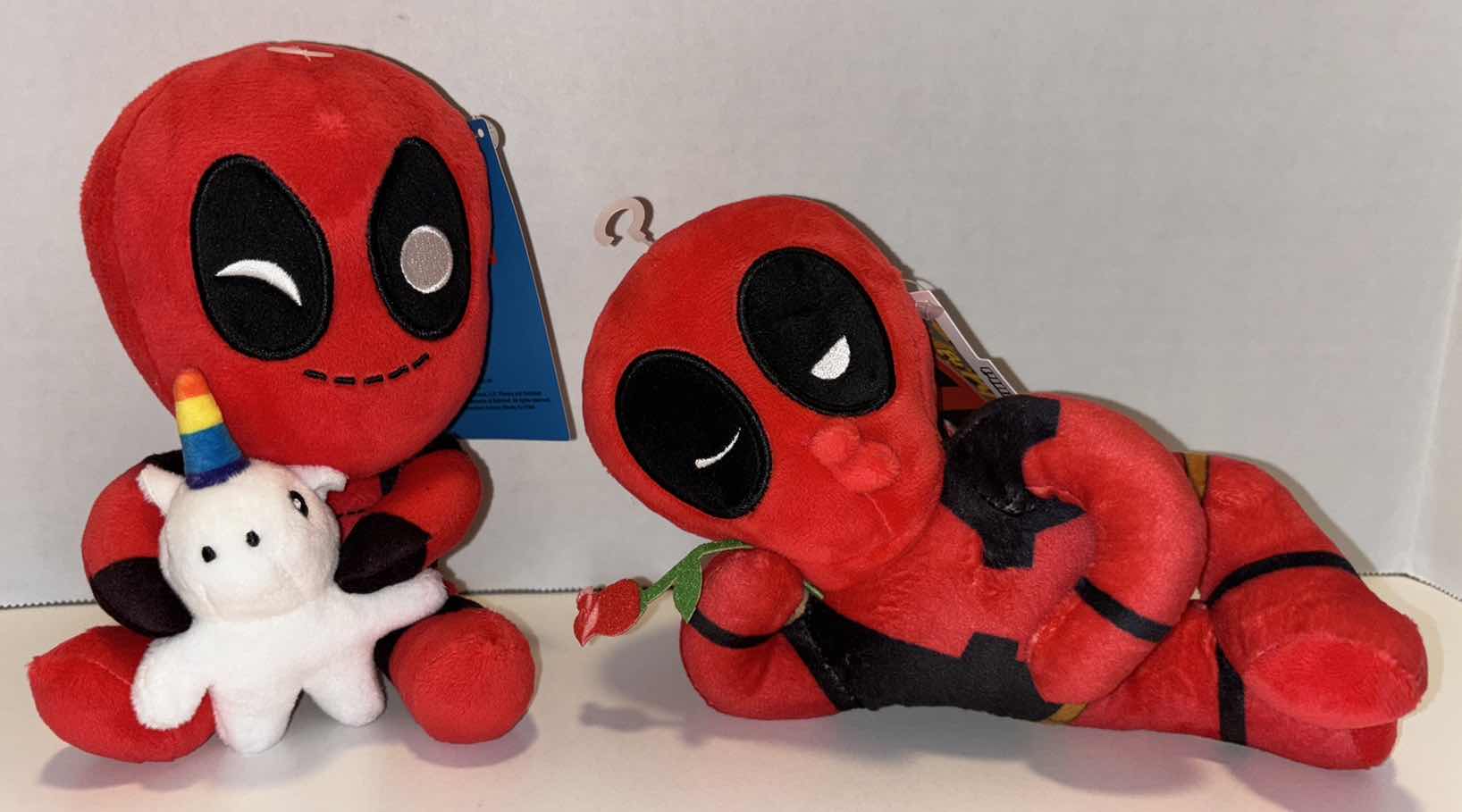 Photo 1 of NEW KIDROBOT MARVEL PHUNNY PLUSH 2-PACK, “DEADPOOL RIDING A UNICORN” & “SEXY DEADPOOL”