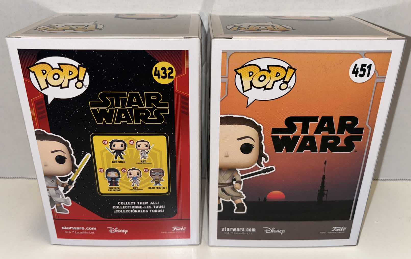 Photo 1 of NEW FUNKO POP! STAR WARS BOBBLE-HEAD VINYL FIGURE 2-PACK, #432 REY (YELLOW LIGHTSABER) & #451 REY (JAKKU)