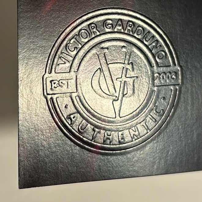 Photo 1 of VICTOR GARDUNO “MAN OF STEEL” 11” X 17” INFINITY GLOSS UNFRAMED PRINT W EMBOSSED SEAL, DIGITAL SIGNATURE & OFFICIAL SIGNATURE W COA INCLUDED, STORED IN A RIGID PRINT PROTECTOR SLEEVE