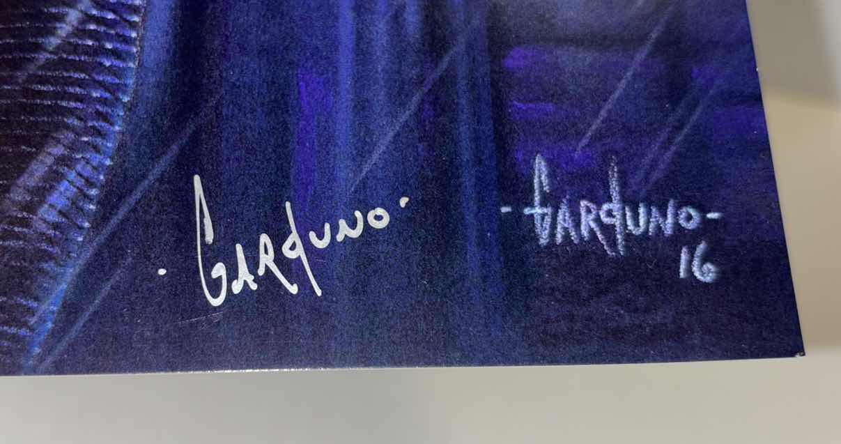 Photo 1 of VICTOR GARDUNO “MAN OF STEEL” 11” X 17” INFINITY GLOSS UNFRAMED PRINT W EMBOSSED SEAL, DIGITAL SIGNATURE & OFFICIAL SIGNATURE W COA INCLUDED, STORED IN A RIGID PRINT PROTECTOR SLEEVE