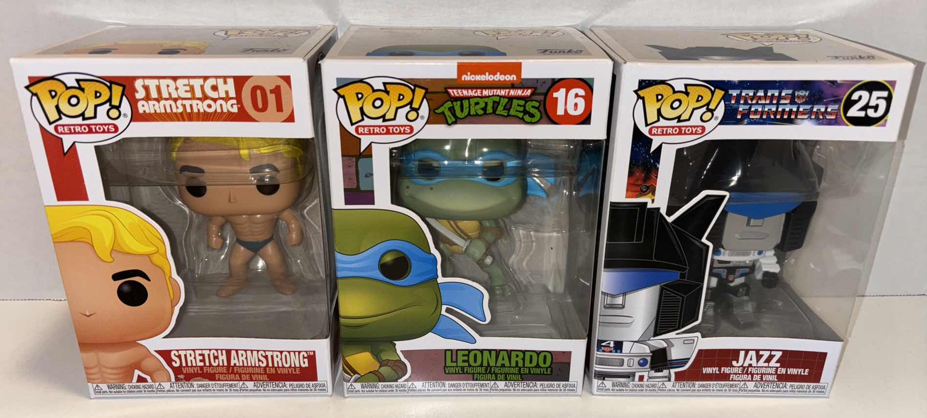 Photo 1 of NEW FUNKO POP! RETRO TOYS VINYL FIGURE 3-PACK, #01 STRETCH ARMSTRONG, TMNT #16 LEONARDO & TRANSFORMERS #25 JAZZ