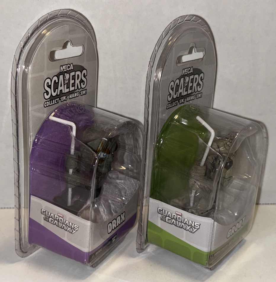 Photo 1 of NEW NECA SCALERS CORD HANGERS 2-PACK, GUARDIANS OF THE GALAXY “DRAX” & “GROOT”