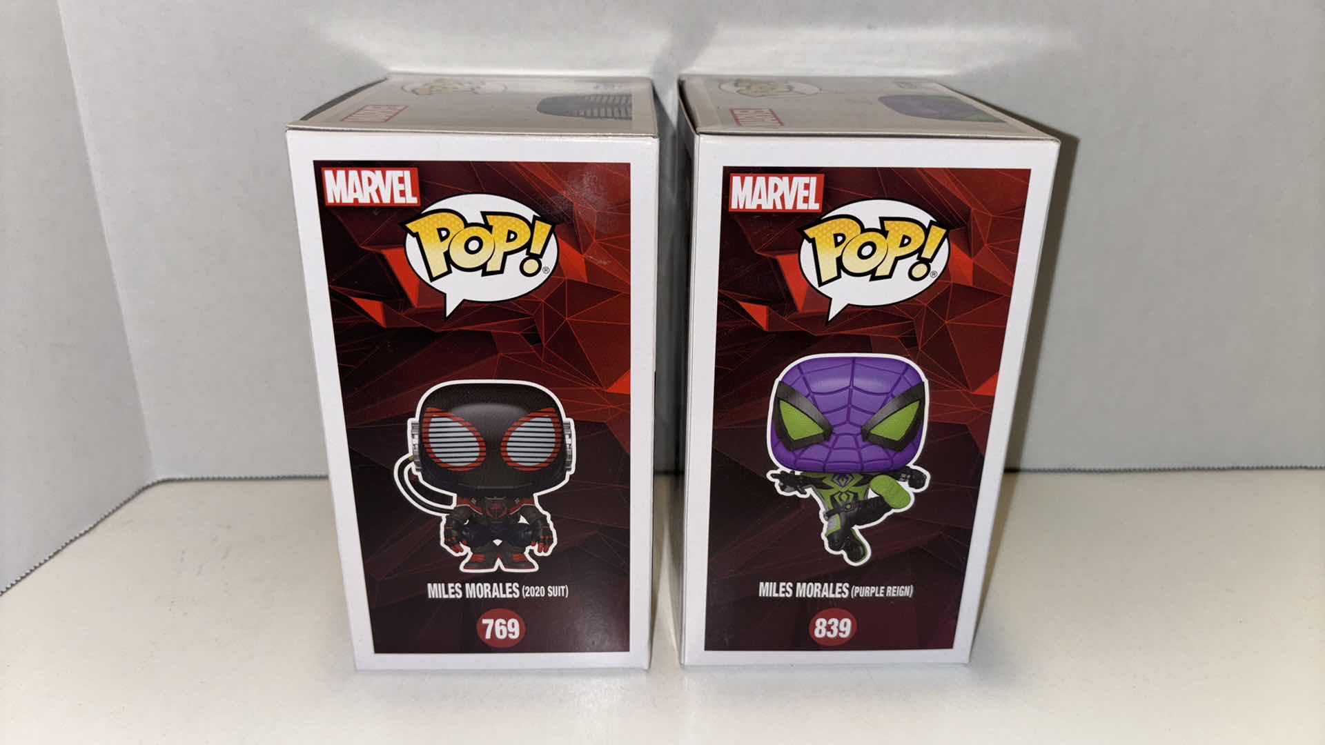Photo 1 of NEW FUNKO POP! MARVEL SPIDER-MAN MILES MORALES 2-PACK BOBBLE-HEAD VINYL FIGURE, #769 MILES MORALES (2020 SUIT) & #839 MILES MORALES (PURPLE REIGN)