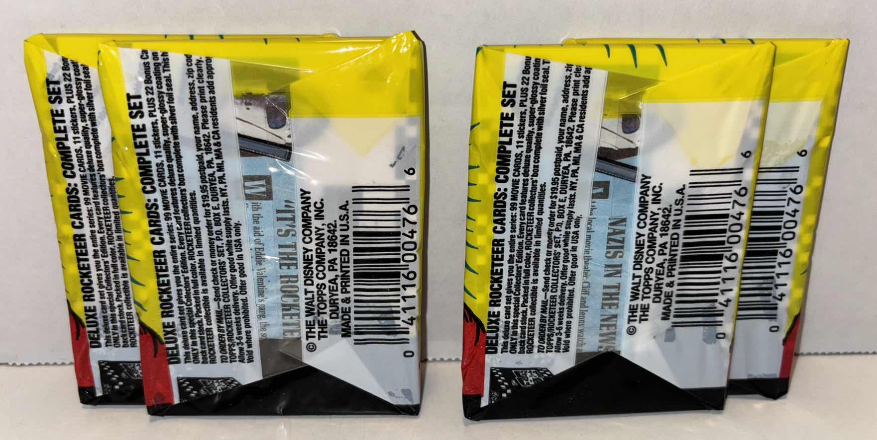 Photo 1 of NEW 4-PACK VINTAGE TOPPS 1991 COLLECTIBLE TRADING CARDS, 8 CT GLOSSY MOVIE CARDS W STICKER, “DELUXE THE ROCKETEER”