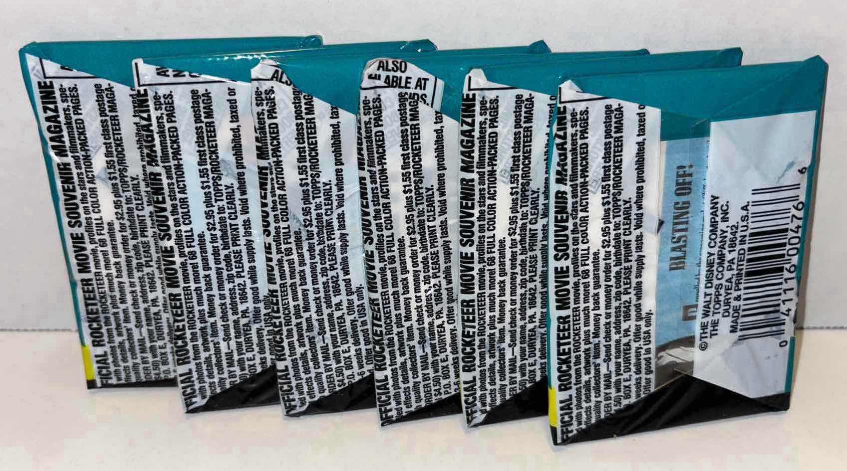 Photo 1 of NEW 6-PACK VINTAGE TOPPS 1991 COLLECTIBLE TRADING CARDS, 8 CT GLOSSY MOVIE CARDS W STICKER, “OFFICIAL ROCKETEER MOVIE SOUVENIR MAGAZINE”