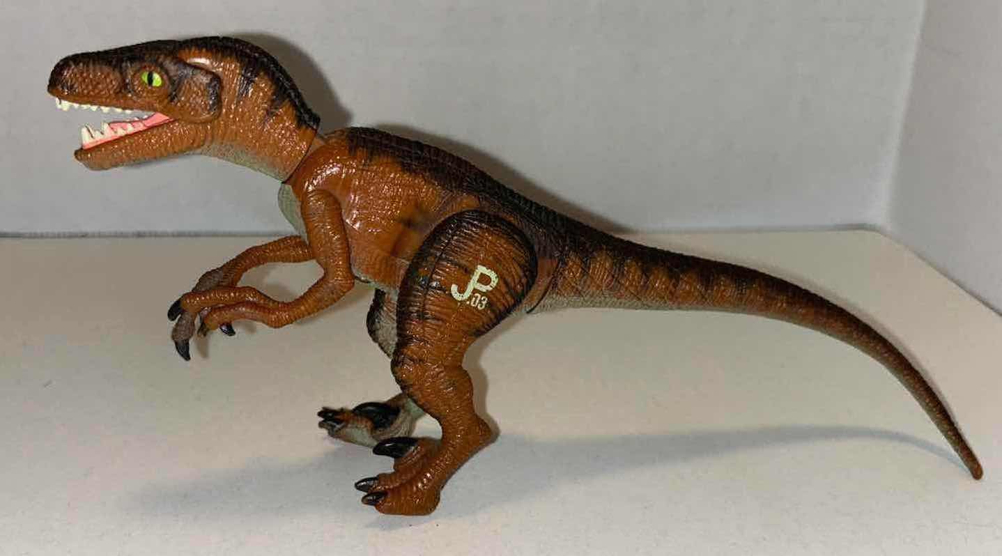 Photo 1 of HASBRO JURASSIC PARK/WORLD ACTION FIGURES (3PCS 2015 JURASSIC WORLD CHOMPING JAWS T-REX, 2015 BATTLE DAMAGE WOUND INDOMINUS REX & VINTAGE 1993 VELOCIRAPTOR)