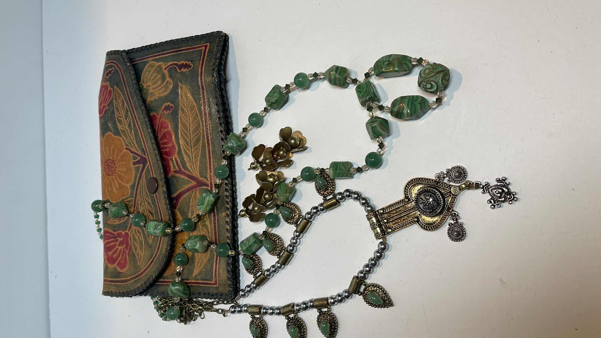 Photo 1 of NATIVE AMERICAN JEWELRY AND HANDMADE LEATHER CLUTCH