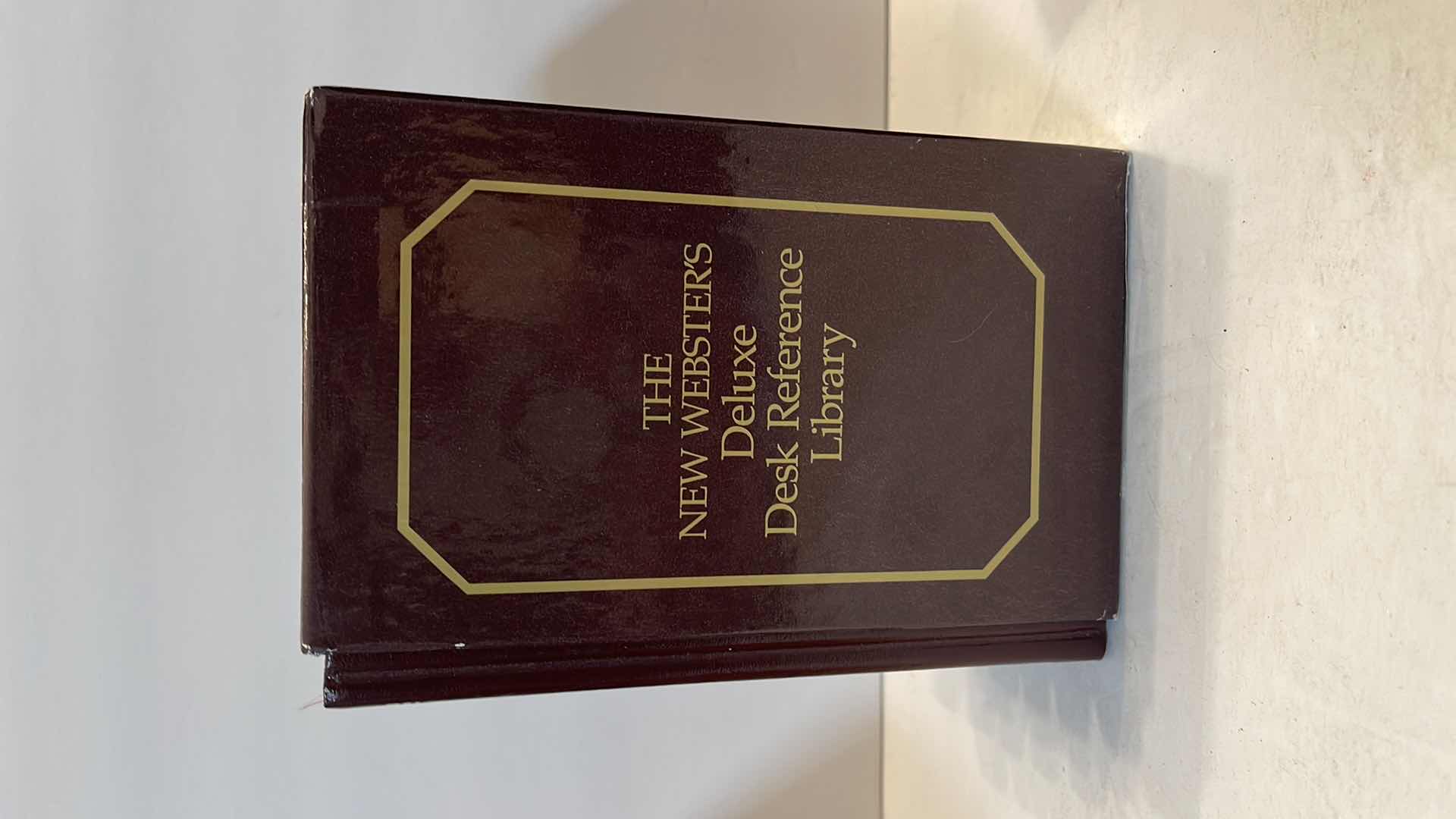 Photo 1 of VINTAGE COLLECTION OF WEBSTER DICTIONARY BOOKS