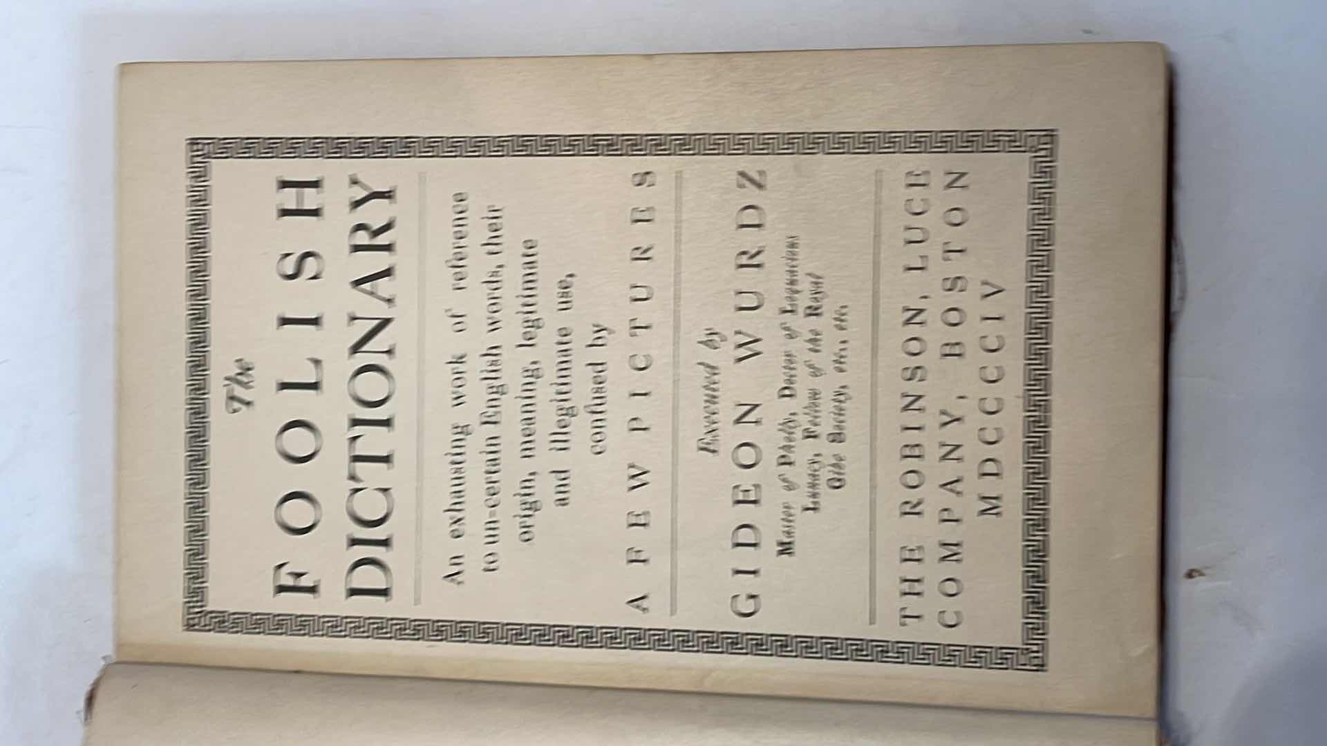 Photo 1 of ANTIQUE 1904 "THE FOOLISH DICTIONARY" BOOK