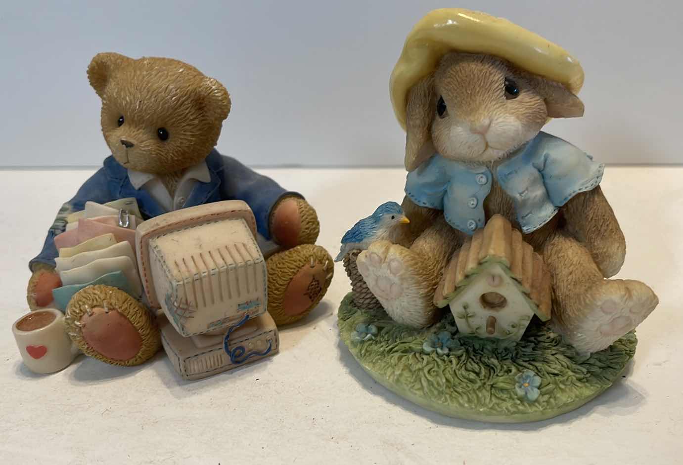 Photo 1 of 4- COLLECTIBLE FIGURINES