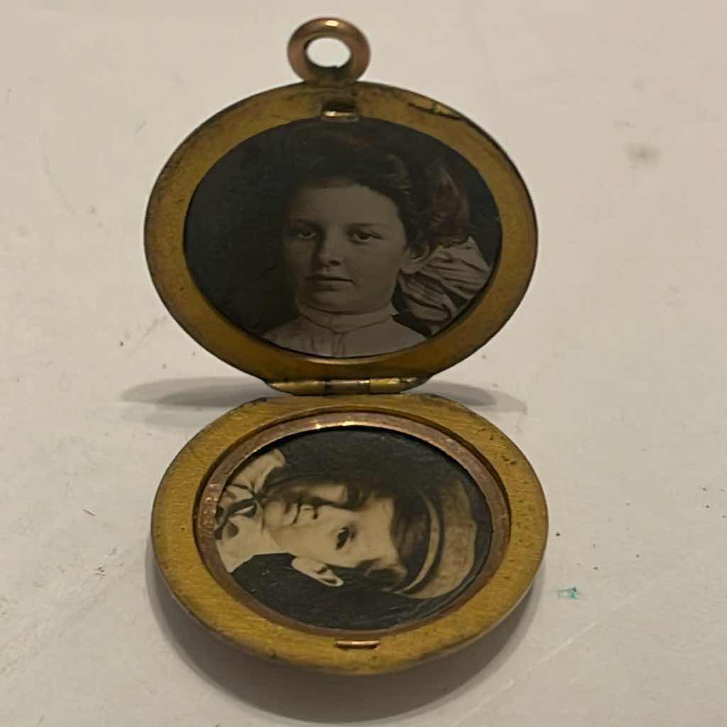 Photo 1 of ANTIQUE BRASS LOCKET W INITIAL "A"