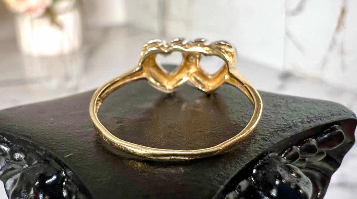 Photo 1 of 14k GOLD OVERLAPPING HEARTS WITH SMALL CENTER DIAMOND CHIP. SIZE 6(APPROX) 