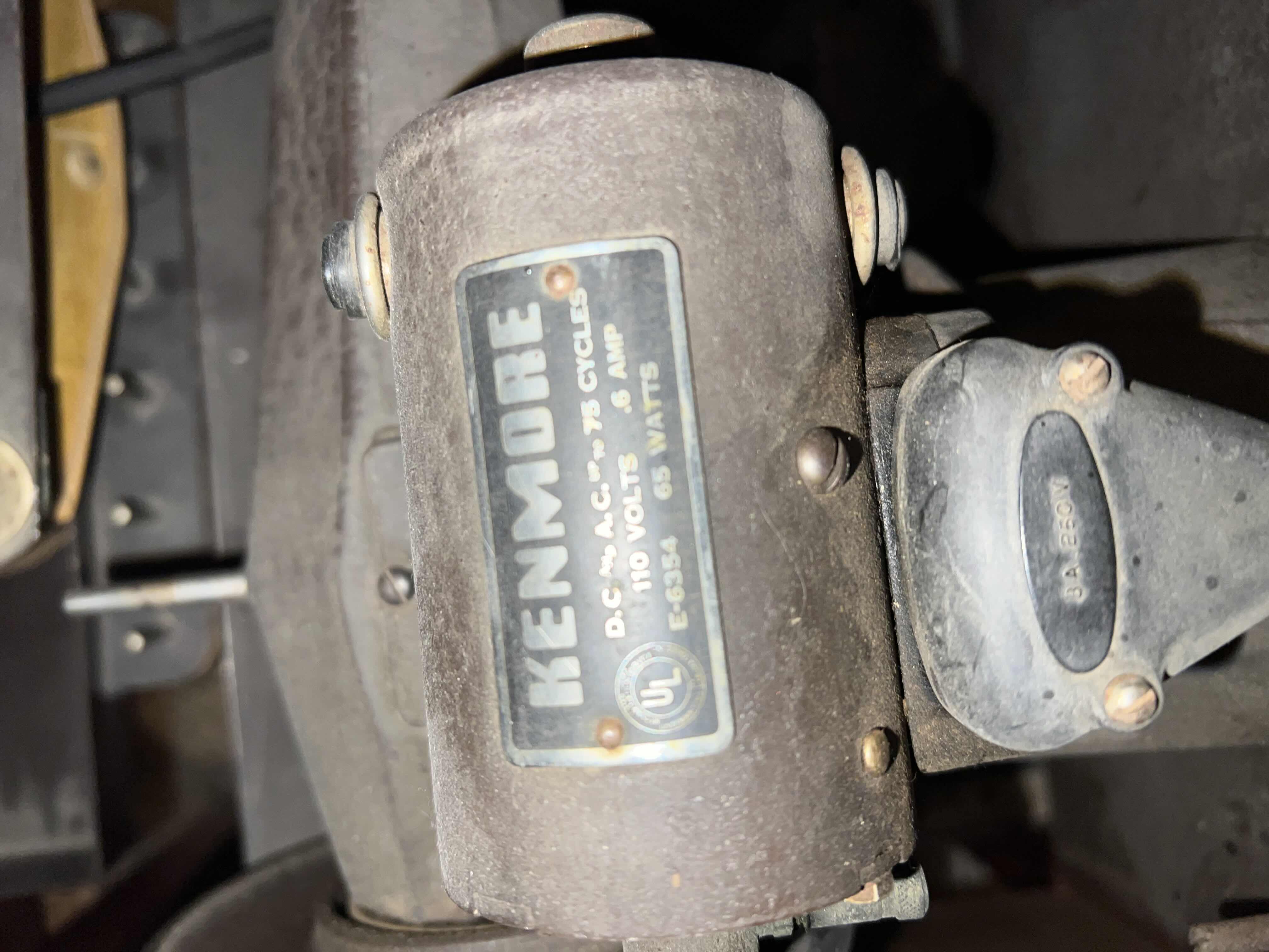 Photo 1 of ANTIQUE 1950’S ROTARY KENMORE SEWING MACHINE. IN WOODEN TABLE WITH TOOLS AND ACCESSORIES. $325