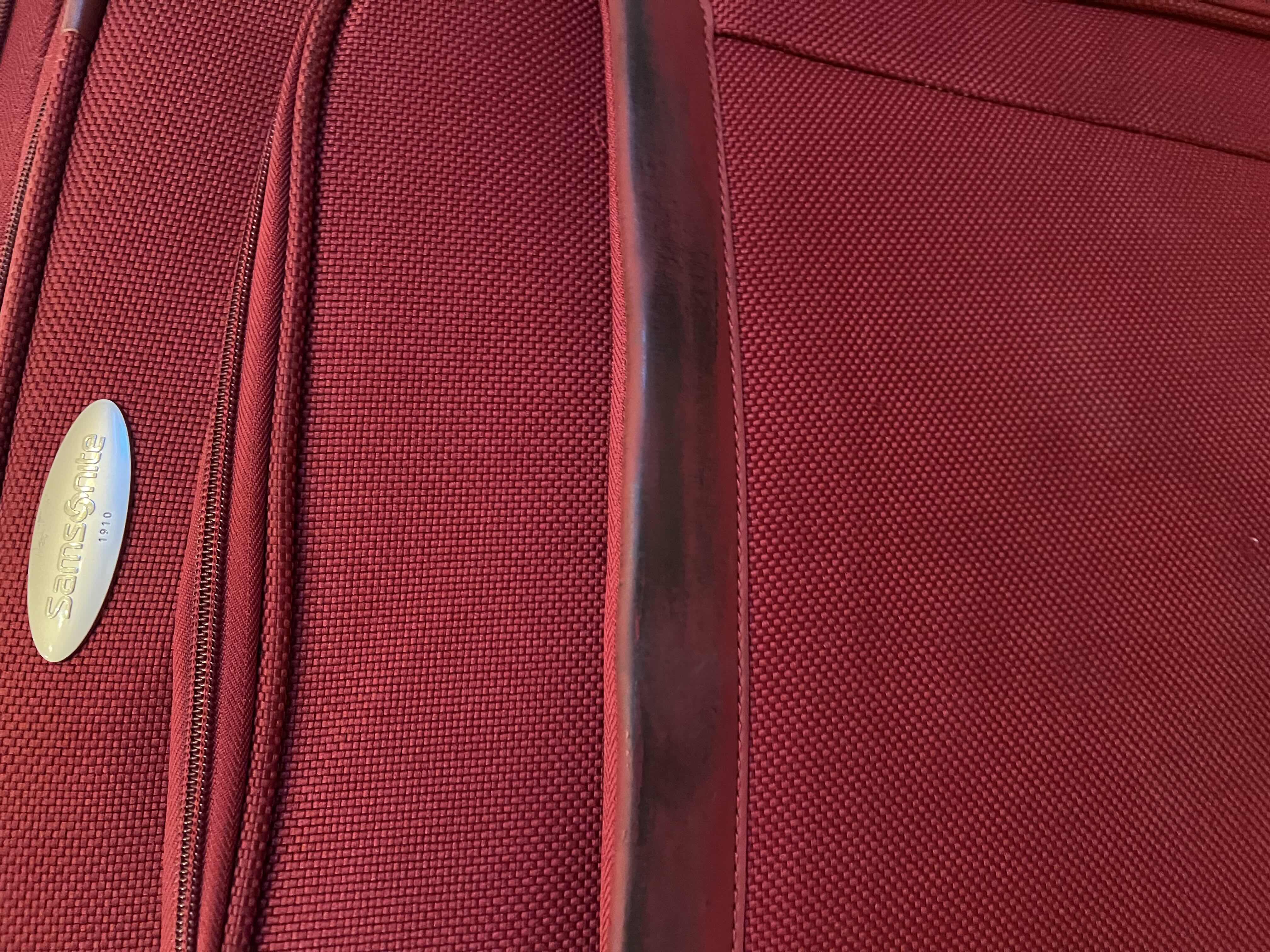 Photo 1 of 2-ROLLER SUITCASES BY SAMSONITE AND MICARY. ONE CARRYON SIZE, ONE SLIGHTLY LARGER.